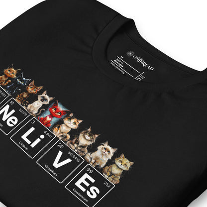 A black t-shirt featuring nine illustrated cats, each with a unique expression, sitting above periodic table elements that spell 'Ni Ne Li V Es' (Nickel, Neon, Lithium, Vanadium, and Einsteinium), representing 'Nine Lives.