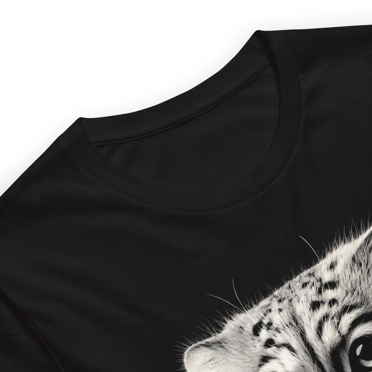 Black t-shirt featuring a close-up, black-and-white illustration of a Pallas kitten's face with striking fur details and intense eyes. Below the image, 'Pallas Cat' is written in elegant white script, followed by 'Otocolobus Manul' in smaller capital letters.