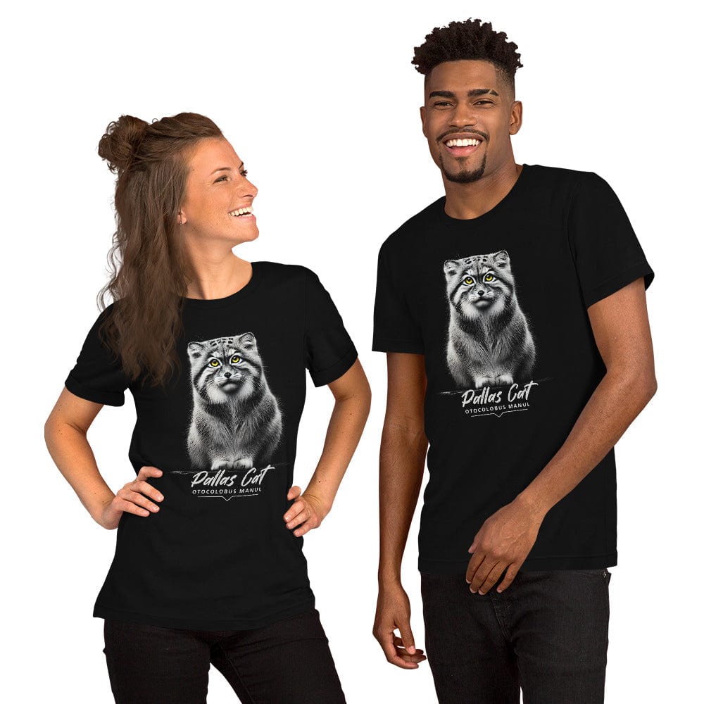 Man and woman wearing black t-shirt featuring a realistic illustration of a Pallas cat with bright yellow eyes, sitting calmly. Below the cat, the text reads 'Pallas Cat' and 'Otocolobus Manul' in an elegant font.