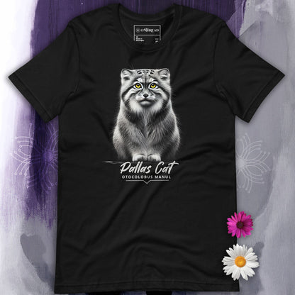 Black t-shirt featuring a realistic illustration of a Pallas cat with bright yellow eyes, sitting calmly. Below the cat, the text reads 'Pallas Cat' and 'Otocolobus Manul' in an elegant font.