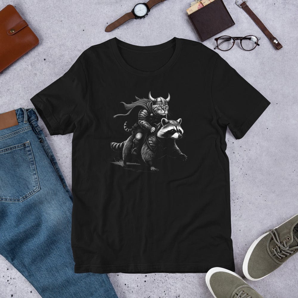 Black t-shirt featuring a Viking-themed illustration of a warrior cat wearing a horned helmet and armor, riding a fierce armored raccoon. 