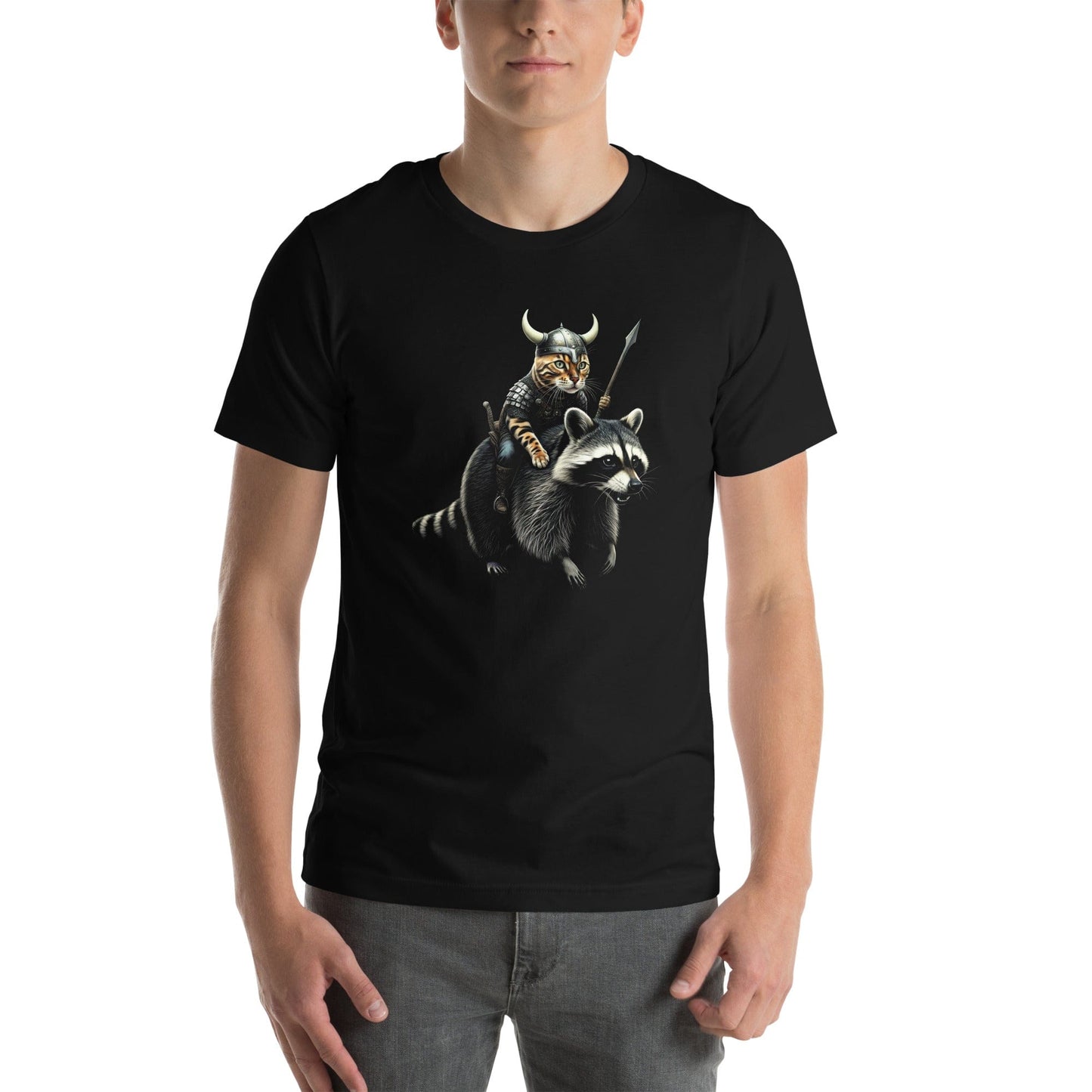 A man wearing a black t-shirt featuring a detailed illustration of a Viking cat wearing a horned helmet and armor, holding a spear, and riding a fierce-looking raccoon. 