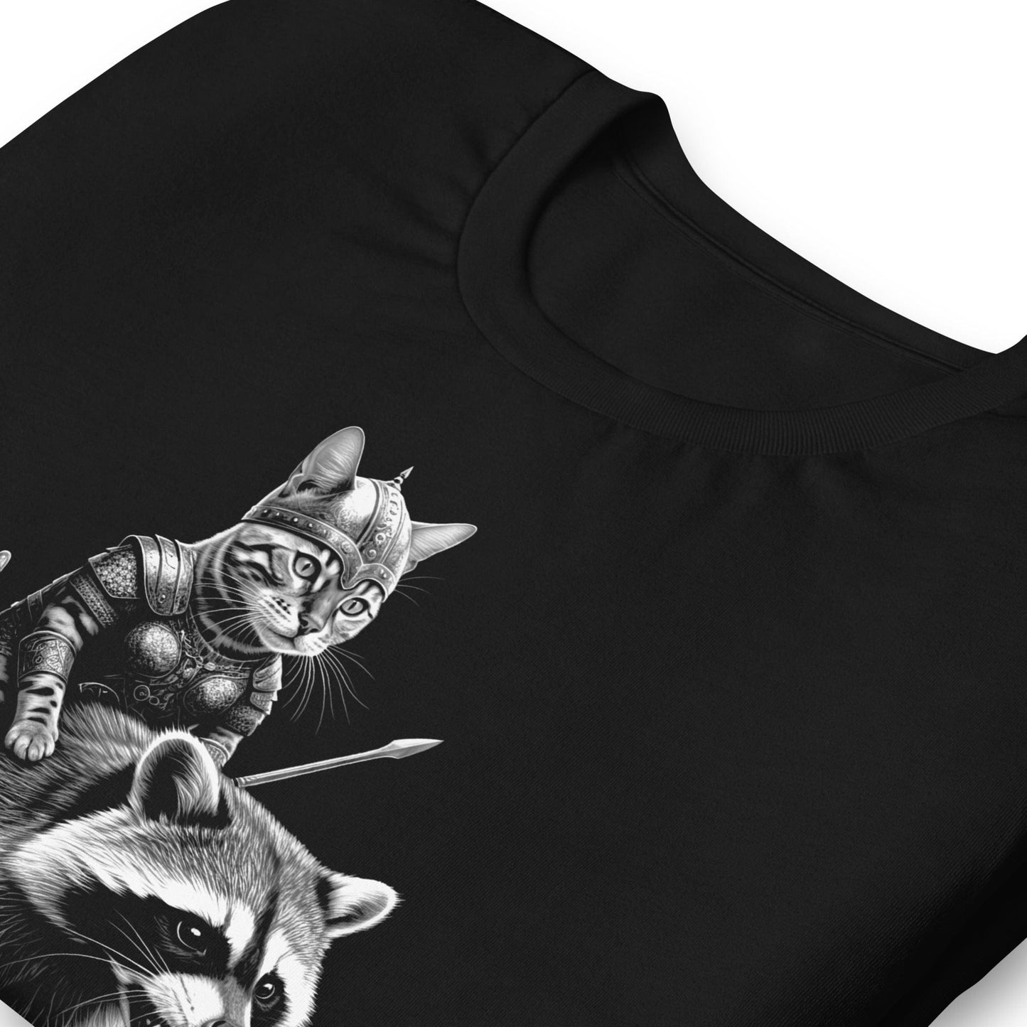 Black t-shirt featuring a Bengal cat dressed as a Viking warrior, riding a raccoon. The detailed design includes the cat in a horned helmet and armor, holding a spear, while the raccoon appears strong and determined.