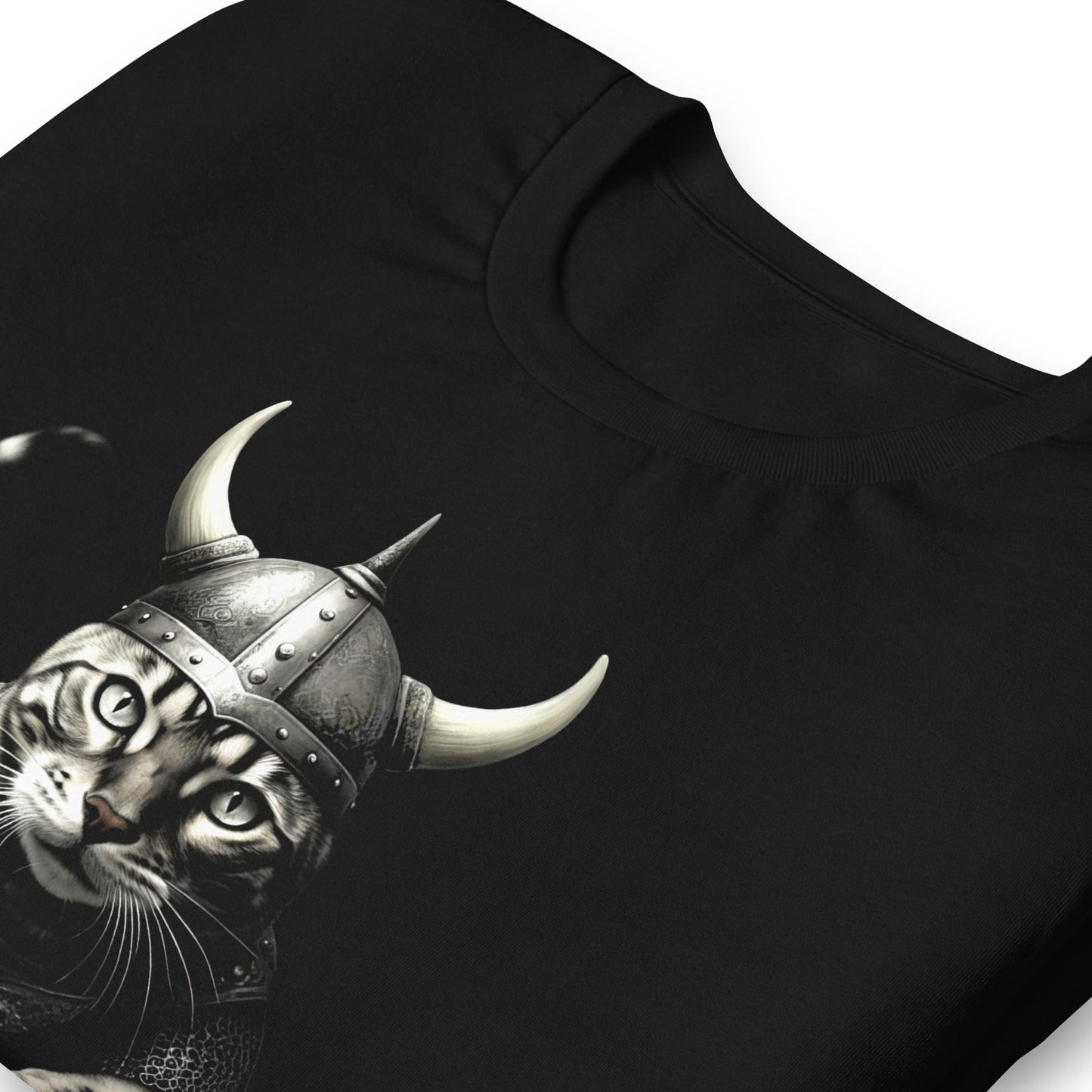 Black t-shirt featuring a detailed illustration of a fierce Viking cat in armor and a horned helmet, mid-stride as if leaping into action. The cat's expression is intense and determined.