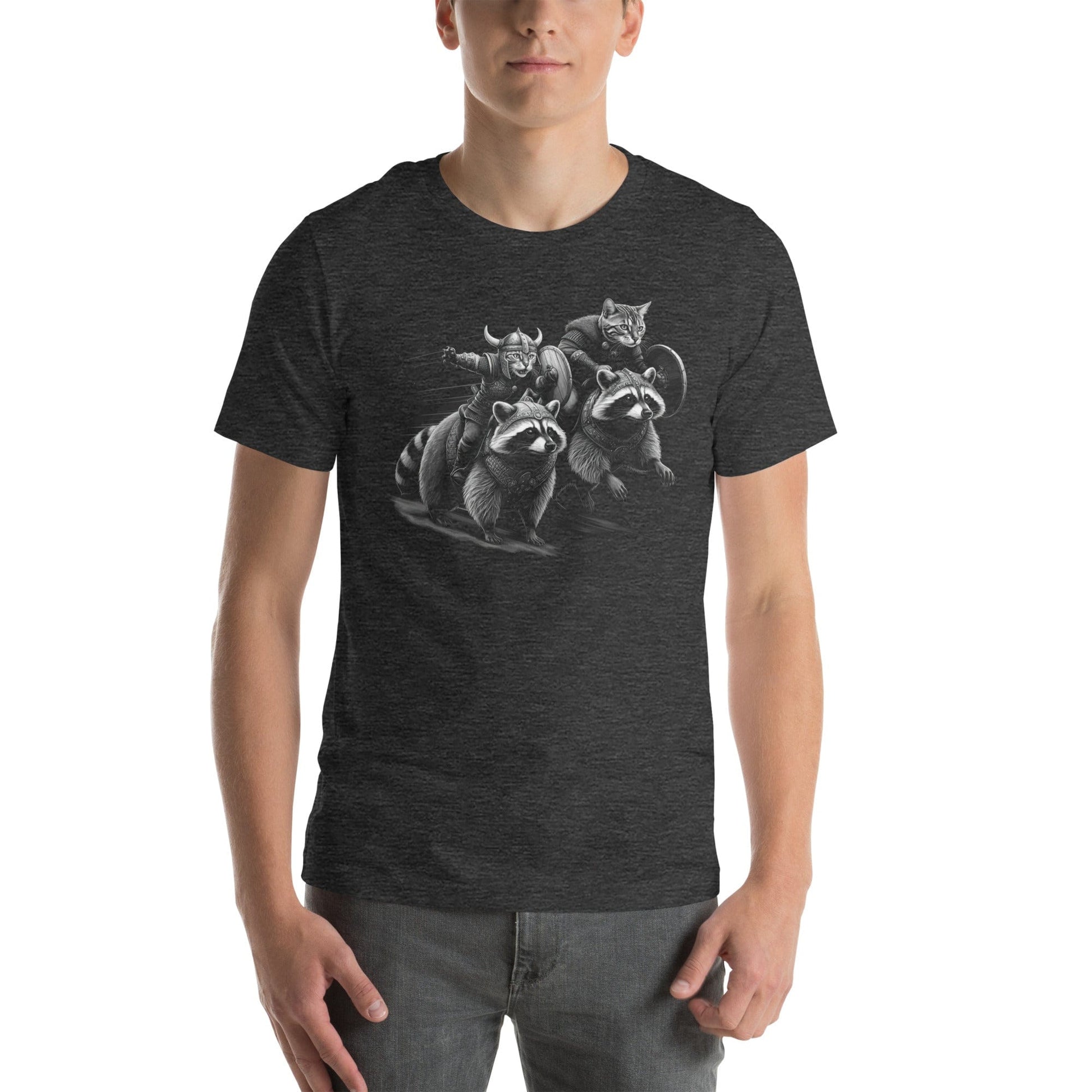 Man wearing dark gray t-shirt featuring two Viking cats wearing armor and helmets, riding armored raccoons. One cat holds a sword, and the other carries a shield. The design is detailed with dynamic movement and intricate linework.